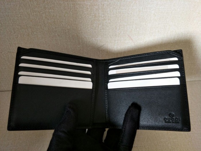 G*u*i  with plaid  bee wallets